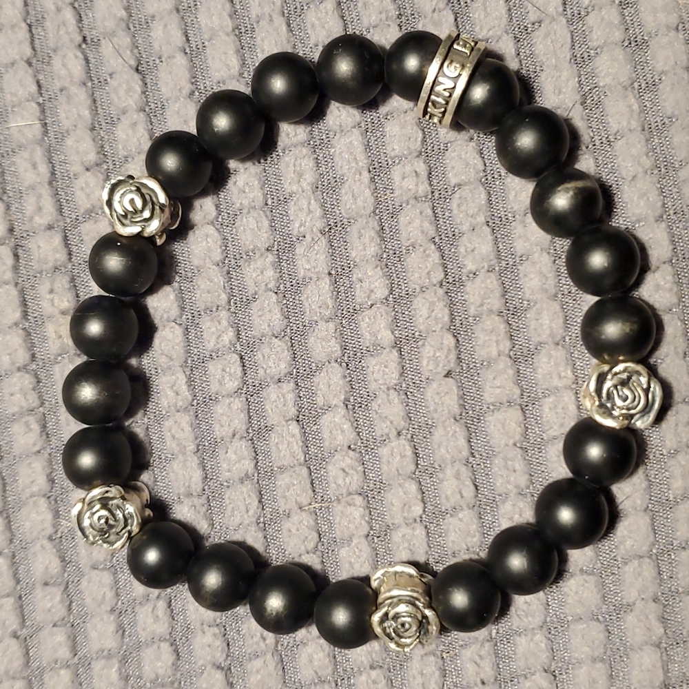 King Baby bracelet with sterling roses & onyx beads.